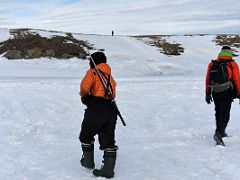 01A Our Local Guide Carries A Rifle For Protection From Polar Bears As We Start Our Walk To Bylot Island On Day 3 Of Floe Edge Adventure Nunavut Canada